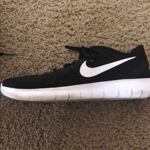 Black Nike free run shoes
